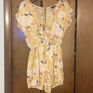 Floral yellow romper. Size Small. Brand As U Wish